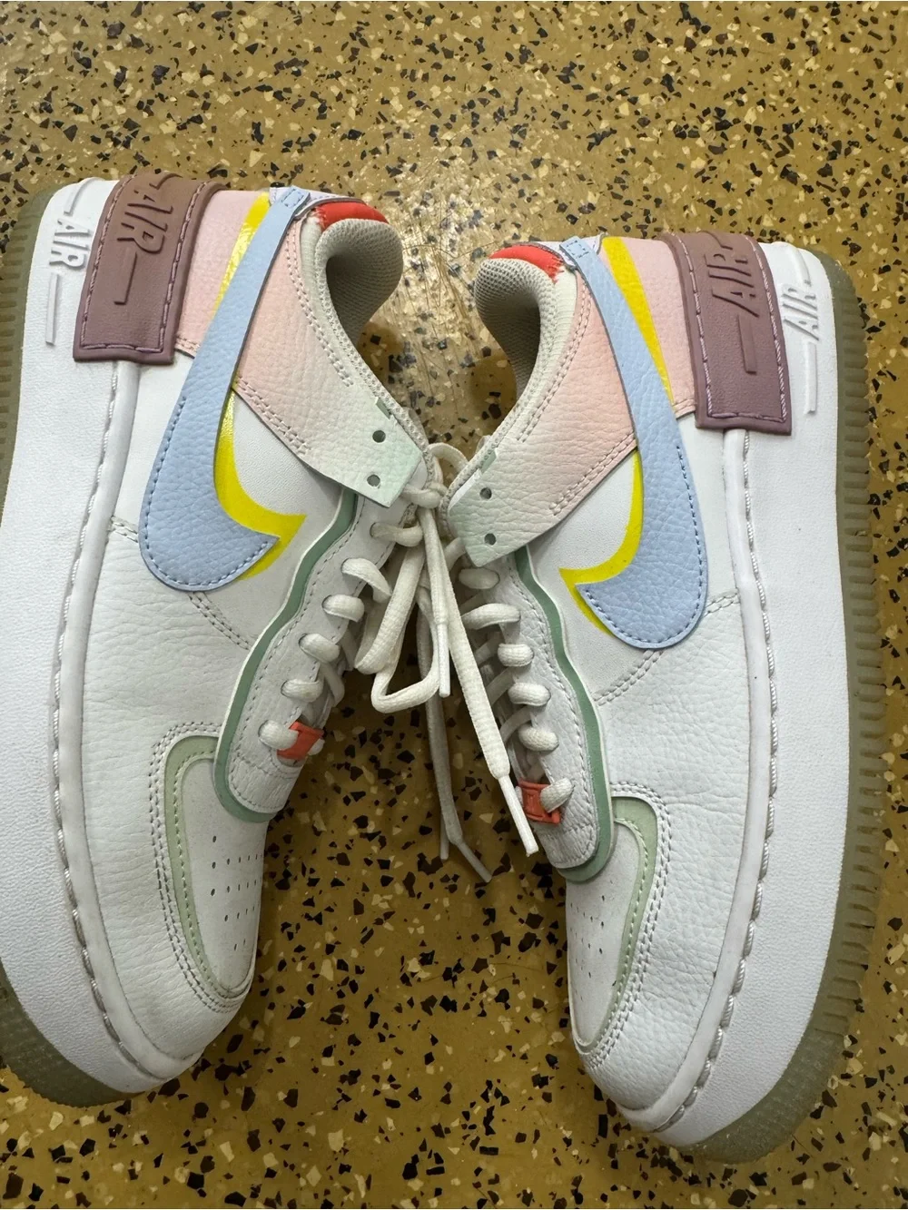 Nike Kids White Sneakers with Pink, Orange and Yellow Accents